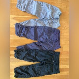 Lululemon cropped dance studio pants, size 2 in Black, Blue, and Gray.